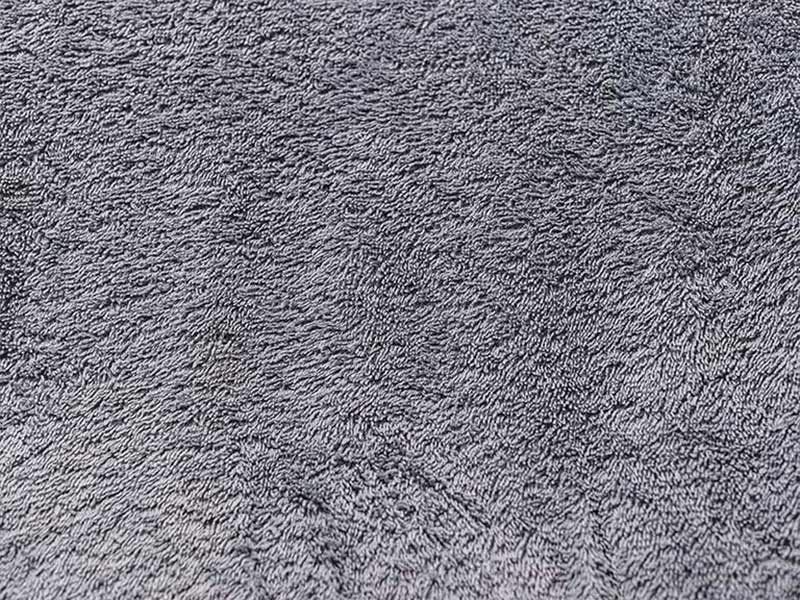 close-up-rolling-out-carpet-sandy-ut