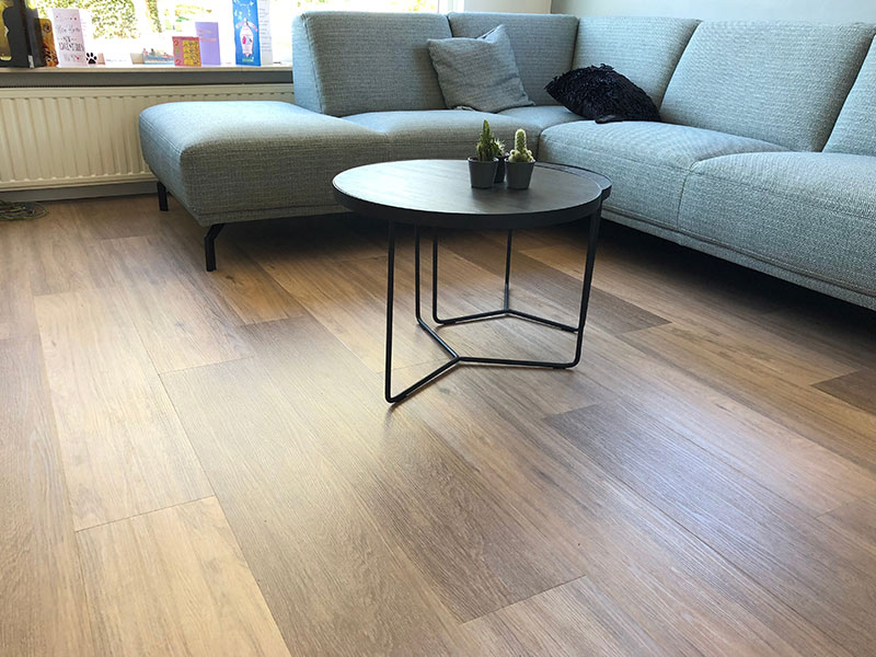 living room with wood pattern sheet vinyl floor riverton ut